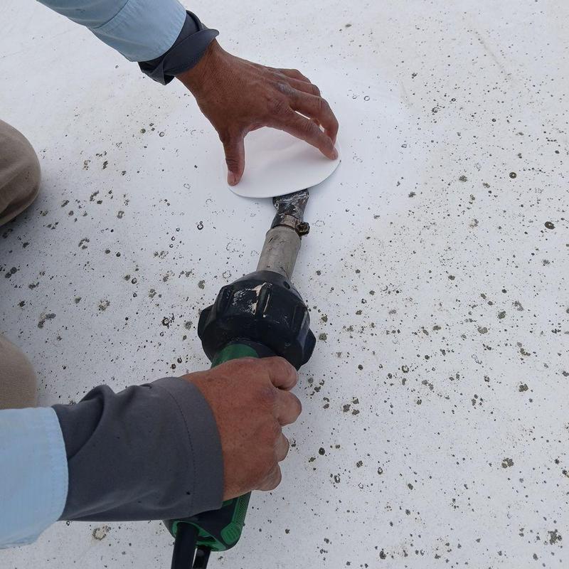 TPO roofing membrane heat welding repair in Covington, TN