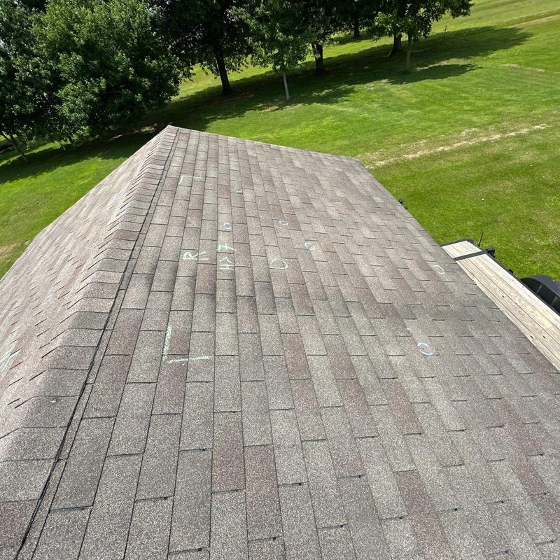 Oakridge asphalt shingles with hail damage markings