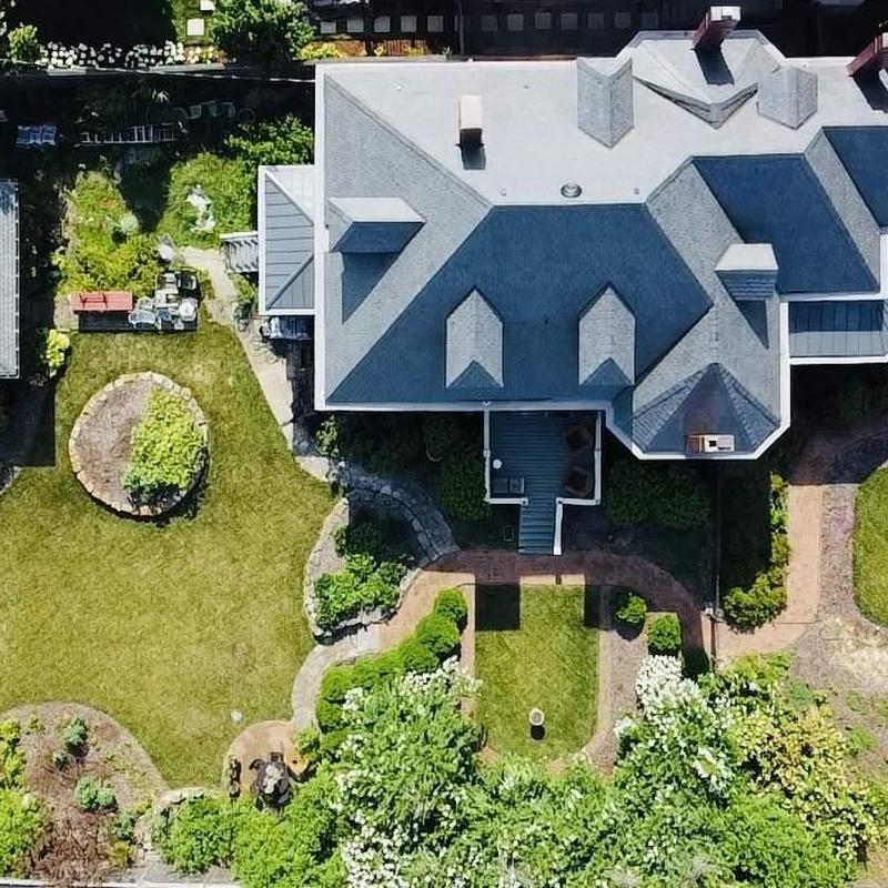 Roof shingles inspection showing damage and wear