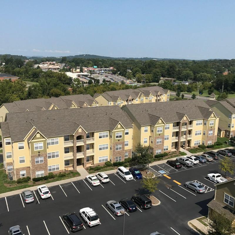 Apartment complex roofing with hail damage inspection
