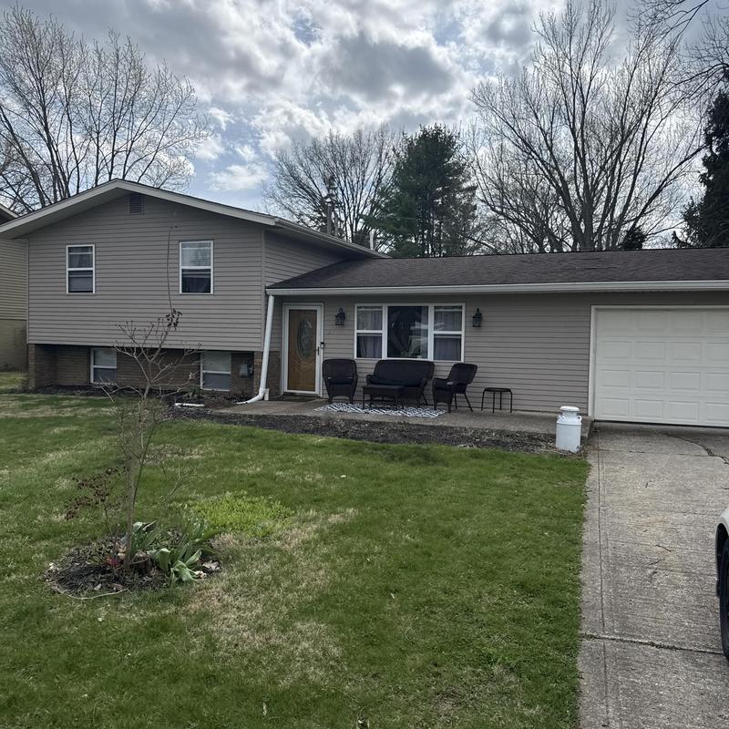 Roof and gutter system inspection on split-level home Roof and gutter system inspection on split-level home