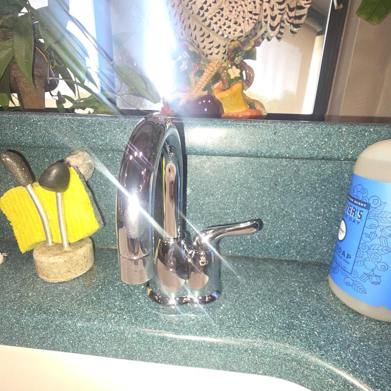 Instant hot water dispenser faucet on kitchen sink countertop