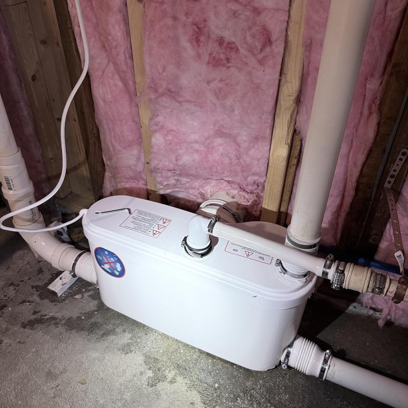 Basement bathroom sewage pump with PVC piping Basement bathroom sewage pump with PVC piping