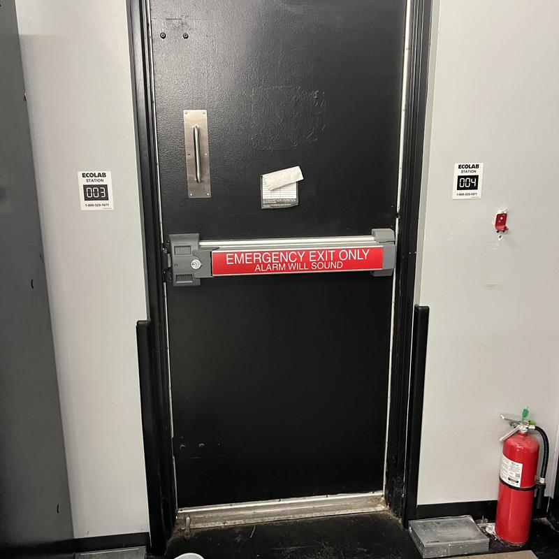 Emergency exit door panic bar with alarm system