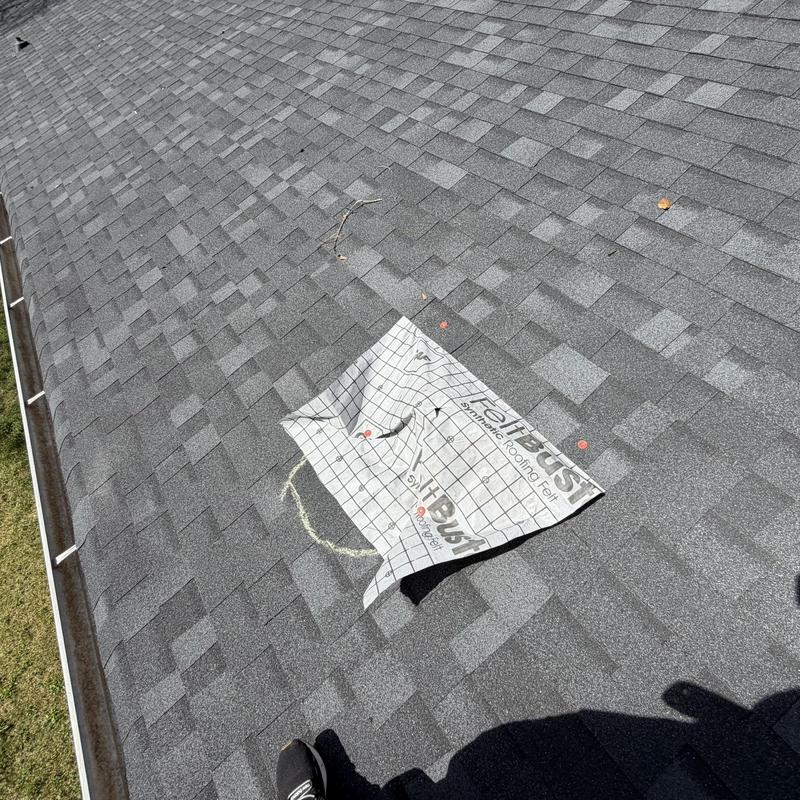 Roof decking replacement with synthetic roofing felt on shingles