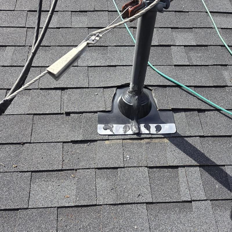 Pipe boot on roof with replaced decking and shingles