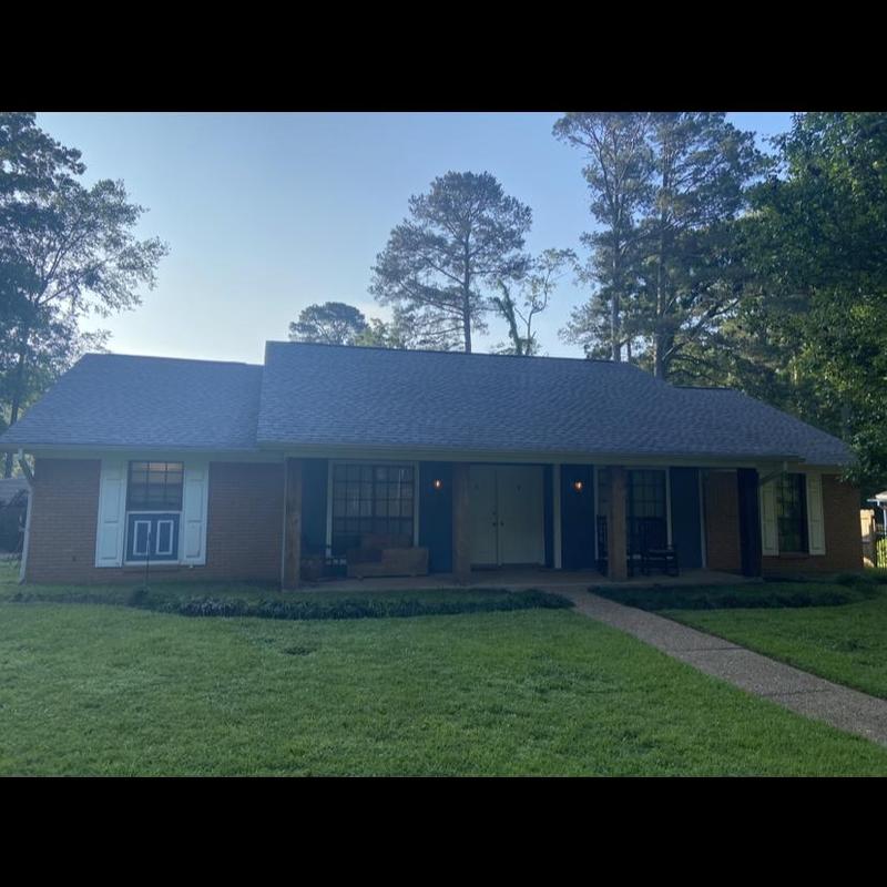 Shingle roof inspection for storm damage on home