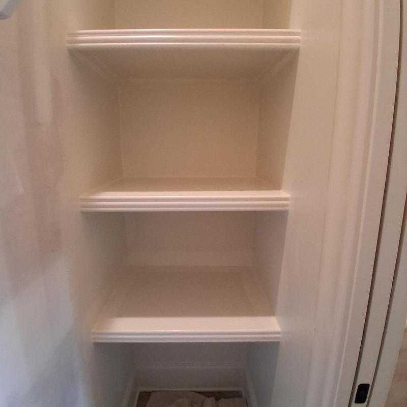 Painted interior shelves and walls in closet