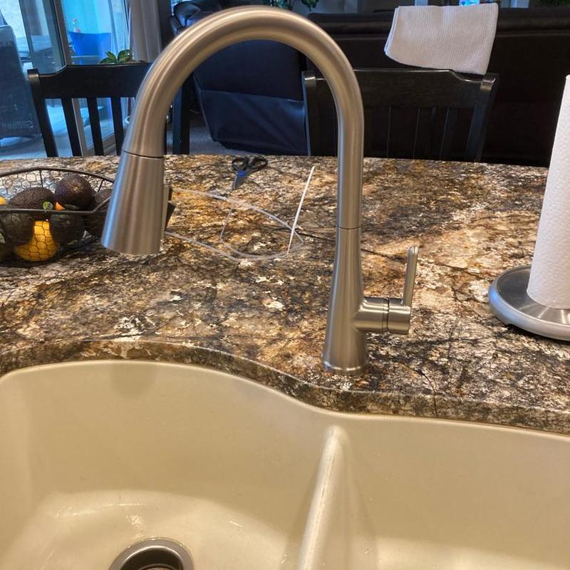 Delta kitchen faucet installation on granite countertop
