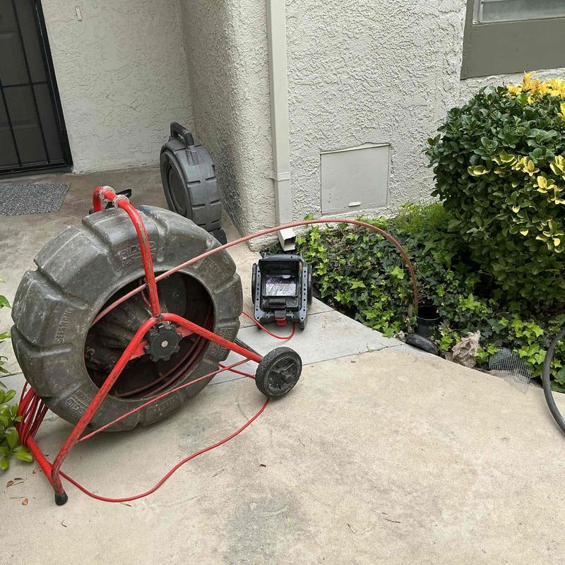 Sewer mainline mechanical snake and CCTV camera system