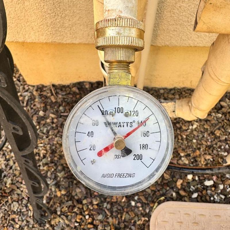 Pressure reducing valve gauge installed near water meter