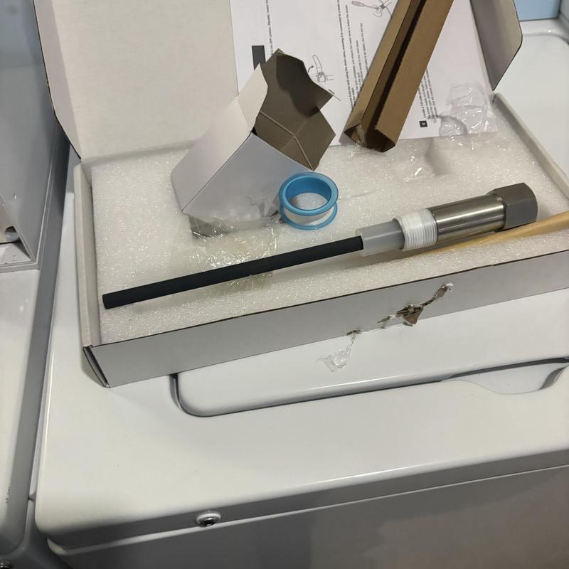 Water heater anode rod and pipe thread tape in box