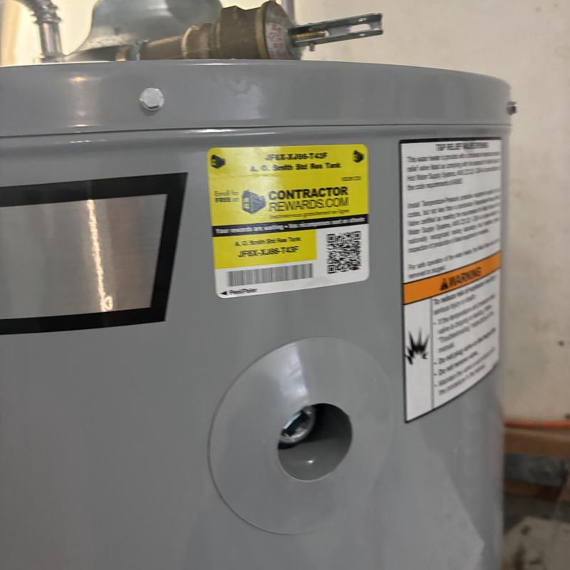 Water heater with installed anode rods and valve reset
