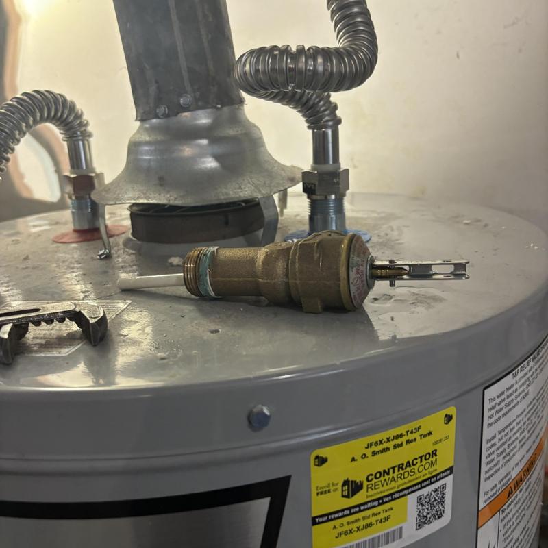Water heater anode rod and pressure valve replacement