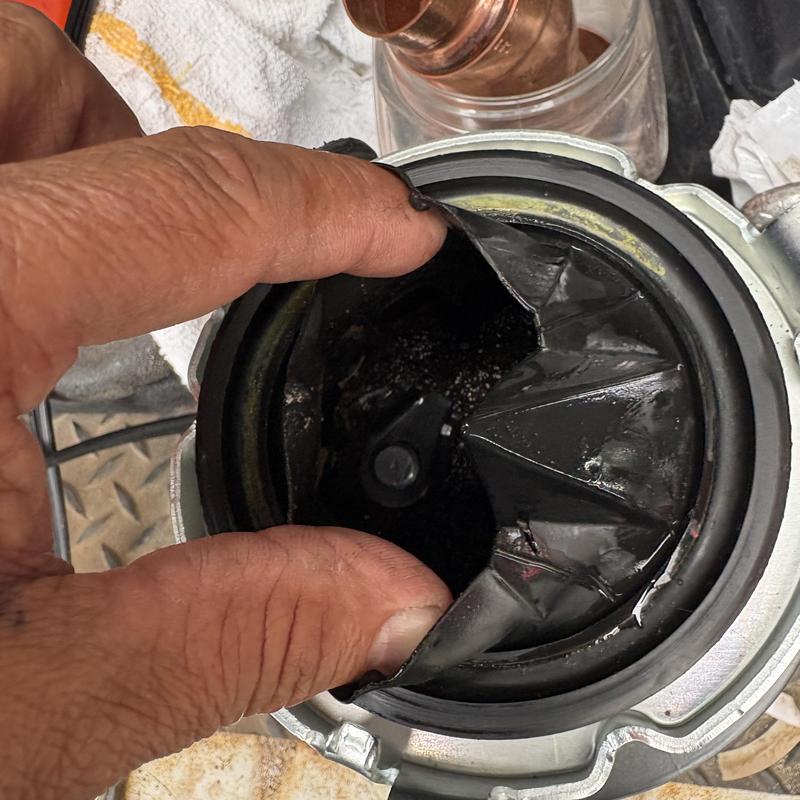 Garbage disposal impeller blade damage inspection