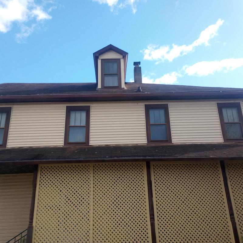 Asphalt shingle roof with dormer inspection