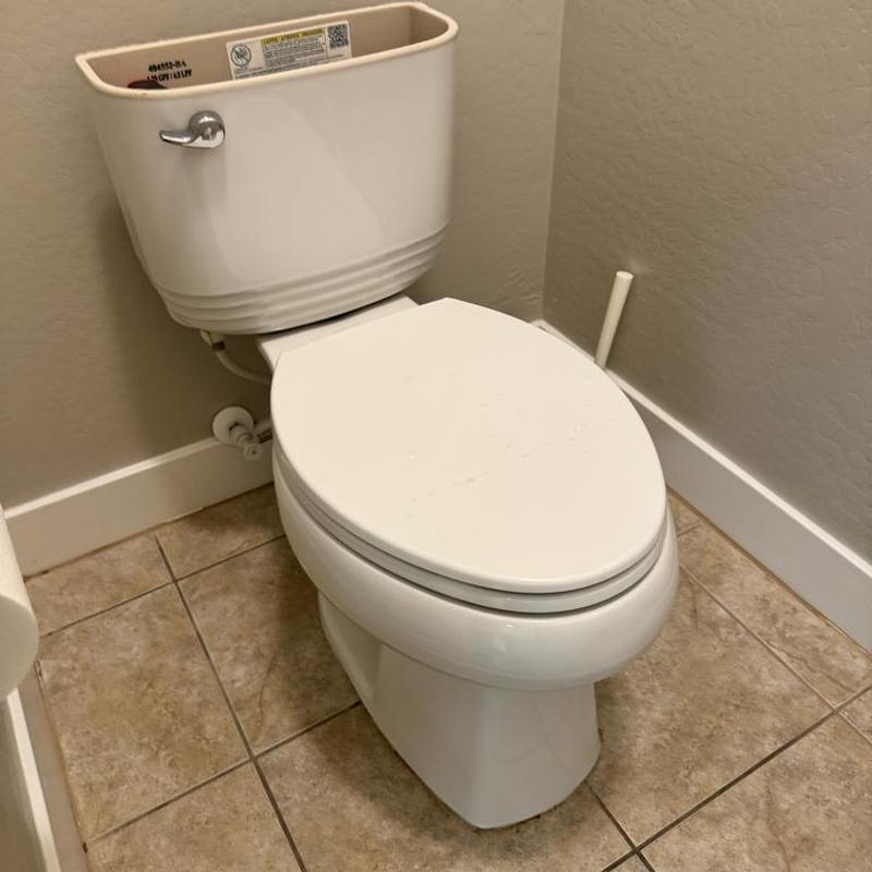 Toilet base with new wax ring and silicone seal