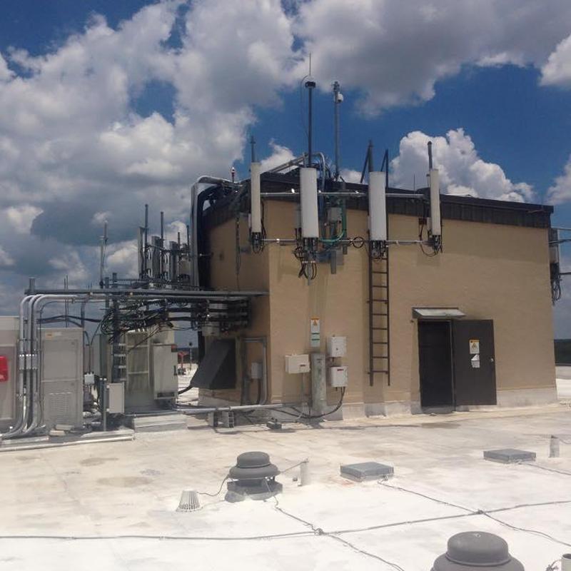 TPO flat roof with commercial antenna installation