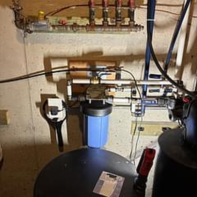 Inline carbon filter cartridge and plumbing system installation