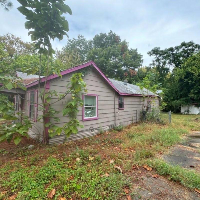 Exterior siding and roof inspection on older house