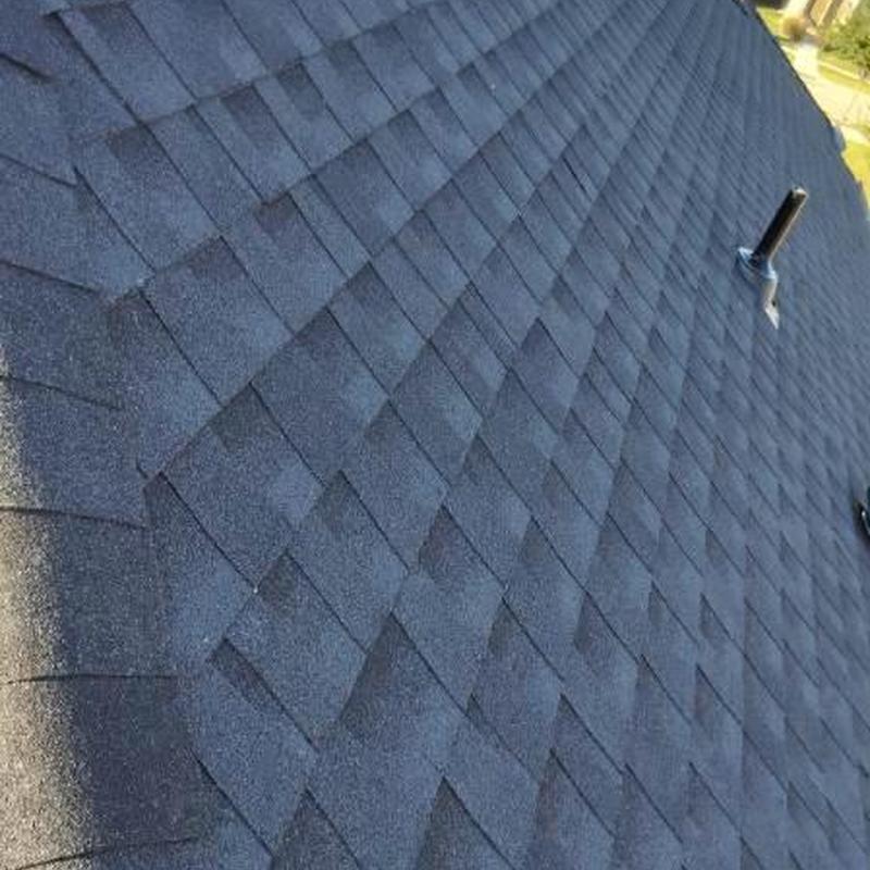 Asphalt shingle roof with vent pipes in Northlake, TX