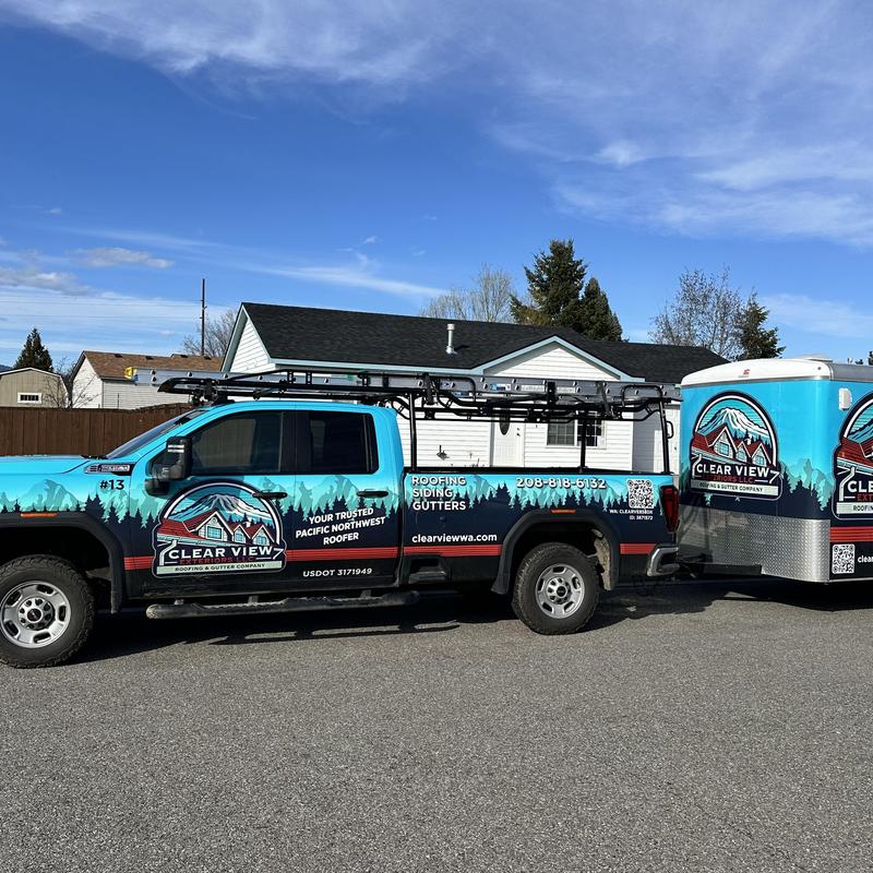 Roofing service truck and trailer by Clear View Exteriors