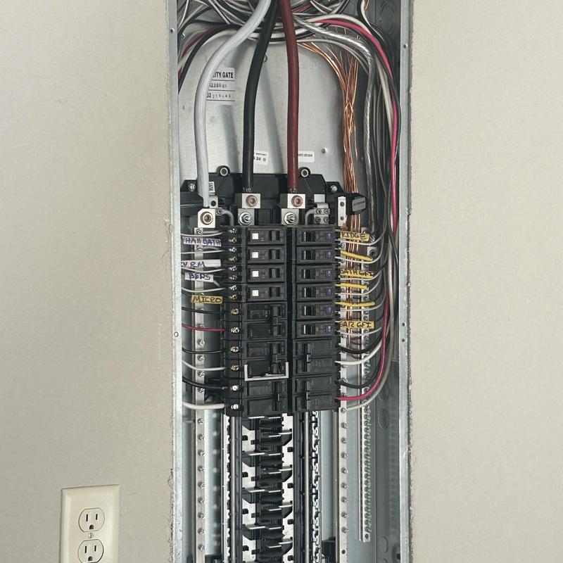 Electrical breaker panel with labeled circuits in duplex