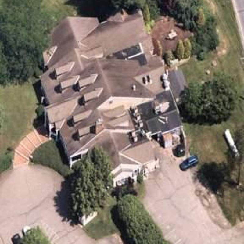 Residential roof with multiple dormer windows inspection