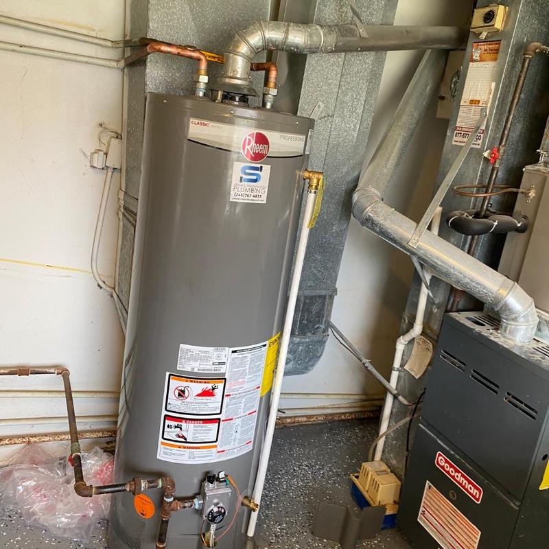 Water heater with new plumbing connections installed
