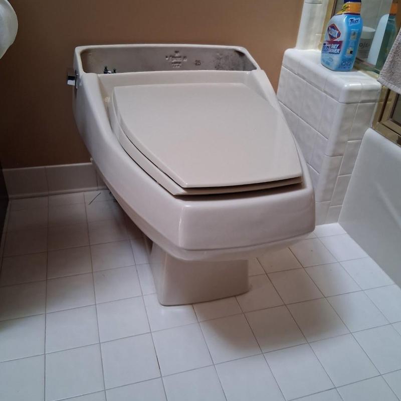 Toilet bowl replacement in bathroom under repair