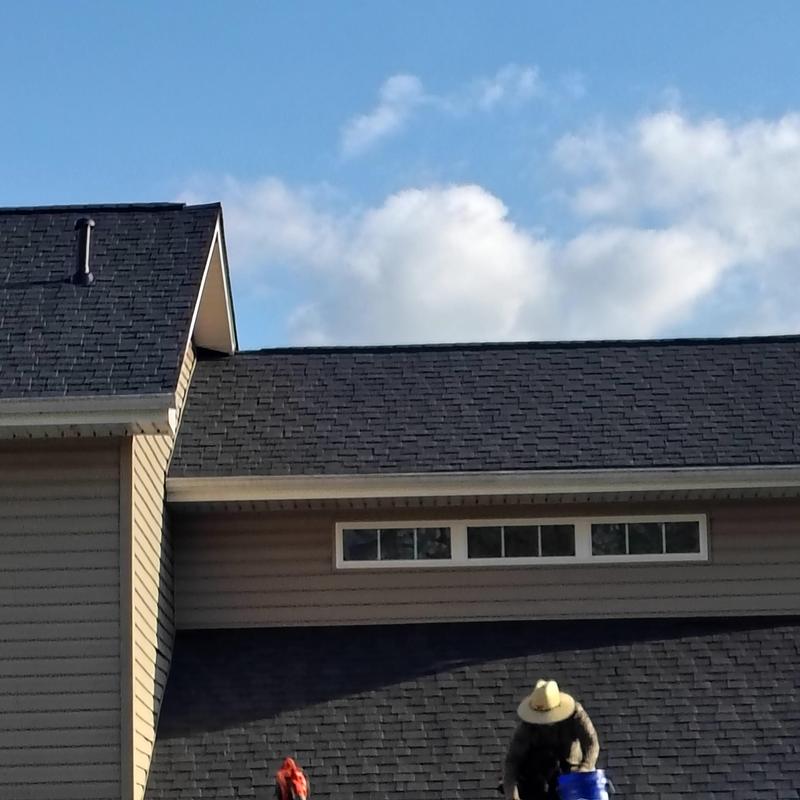 Atlas shingles roof installation on residential house