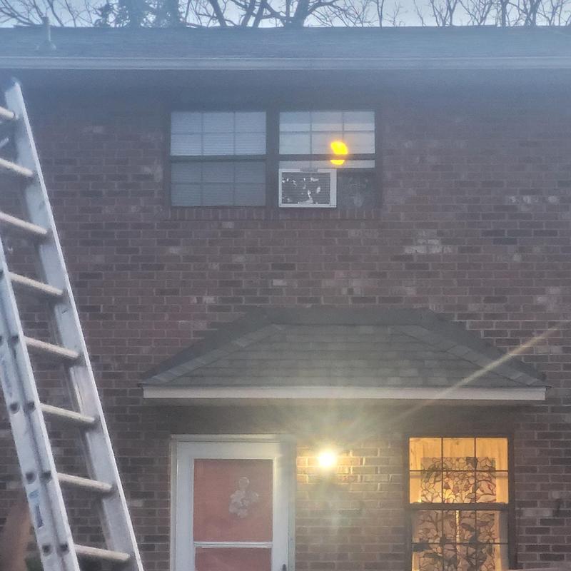 Condo roof with Atlas shingles in weathered wood color