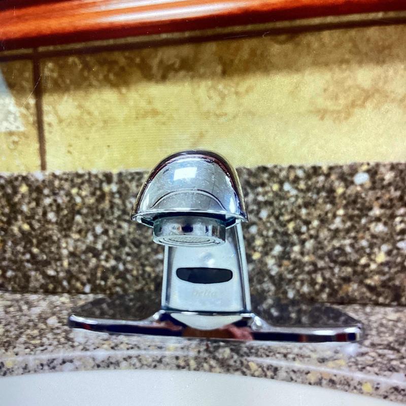 Sensor Zurn faucet installed on granite countertop