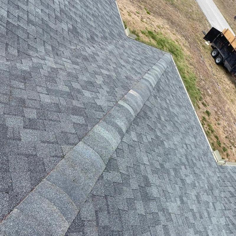 Shingle roof hip and eave with repairs in Cape Coral