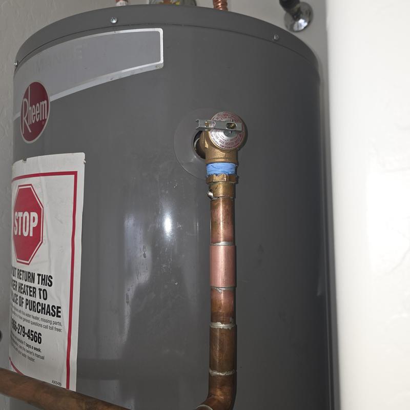 Water heater temperature and pressure valve with piping