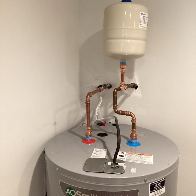 Water heater with copper supply lines and expansion tank