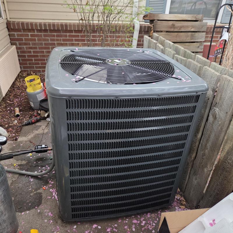 Condenser unit replacement at residential building