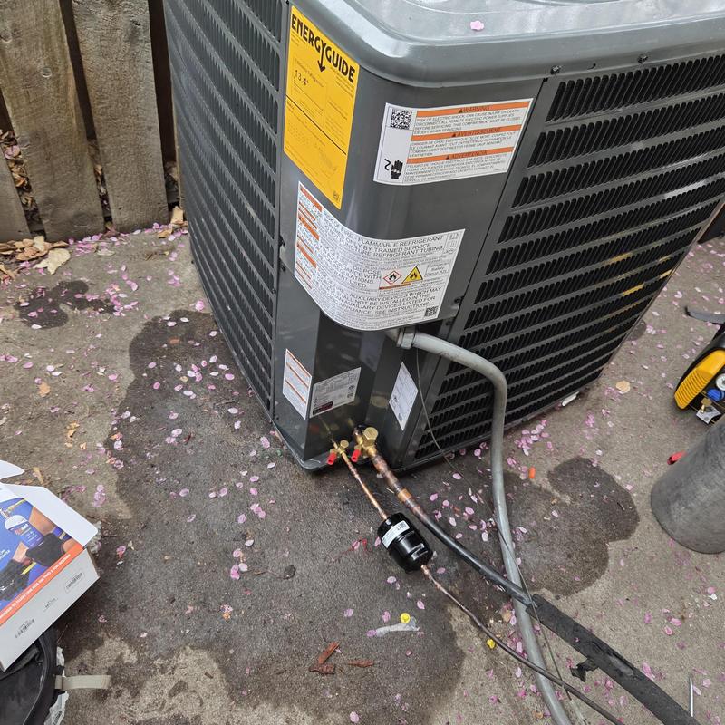 Condenser unit with refrigerant linework and gauge manifold