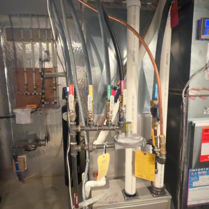 Gas manifold and piping with valves in utility room
