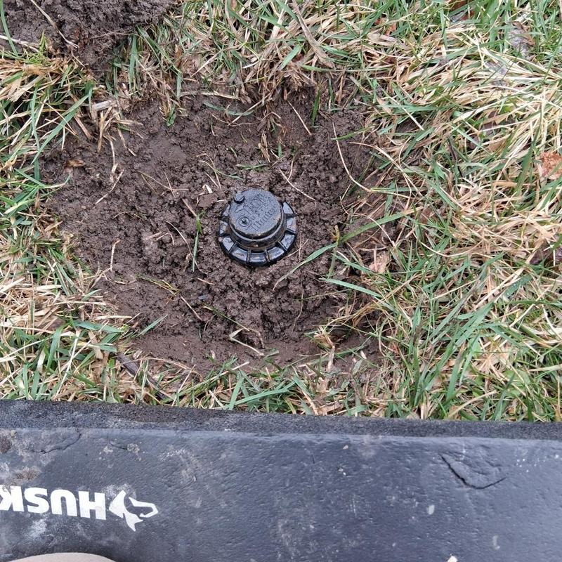 Rotor sprinkler heads in turf with soil excavation
