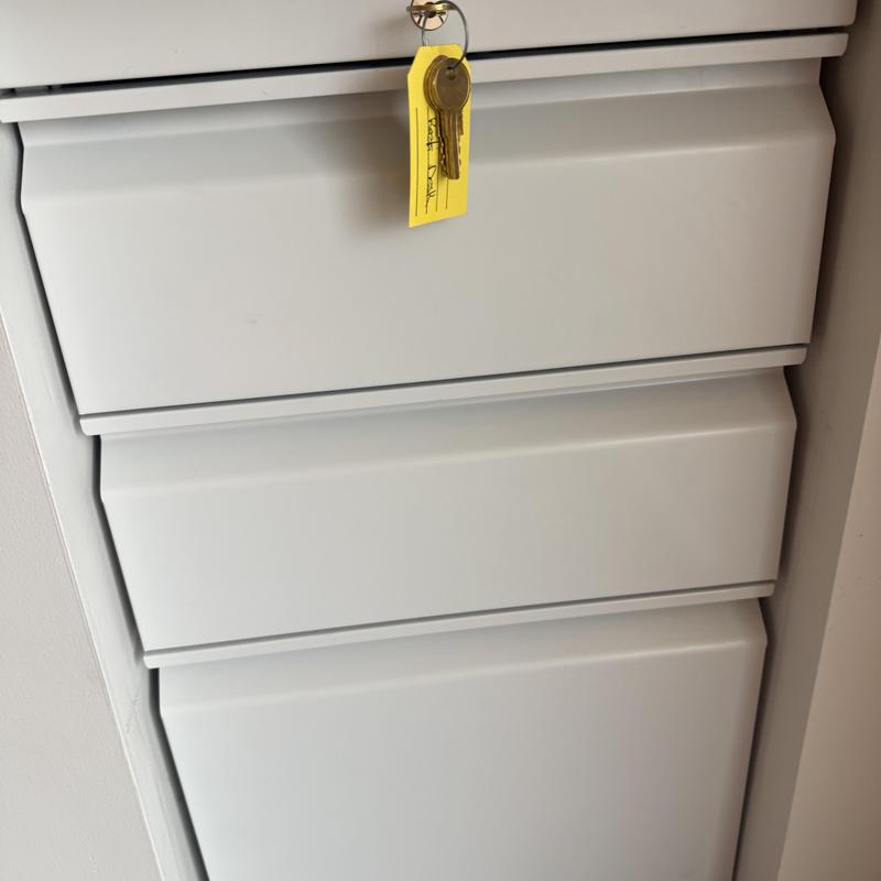 Reception desk lock keys with key tag hanging