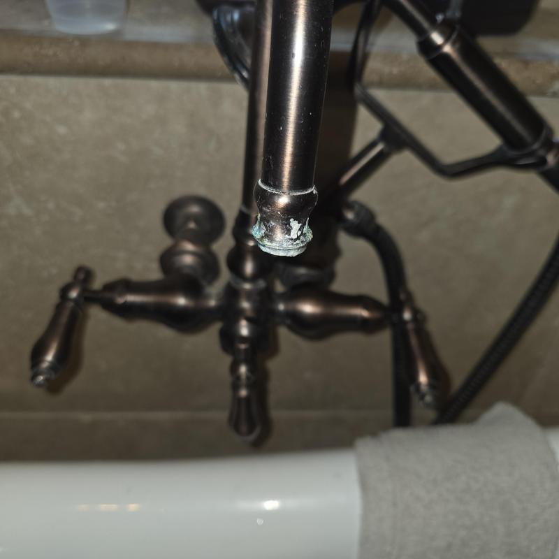 Wall mount tub filler with corroded spout end