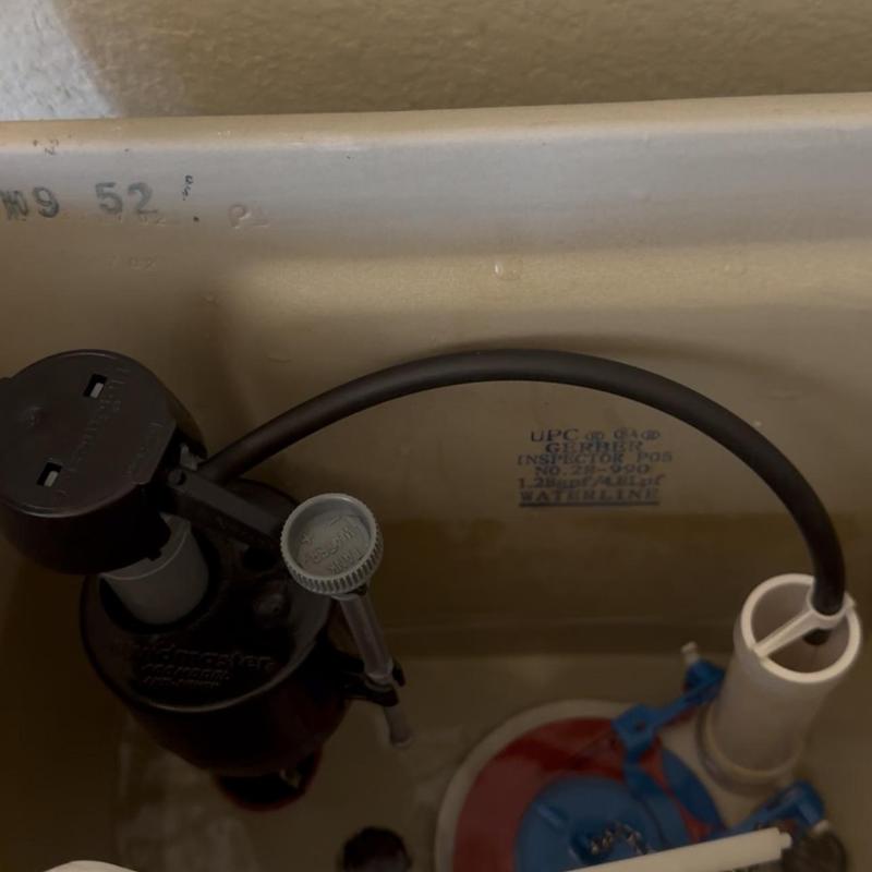 Toilet fill valve and flush mechanism inside tank