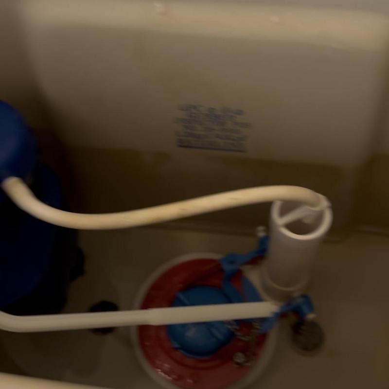 Toilet fill valve and flush mechanism inside tank