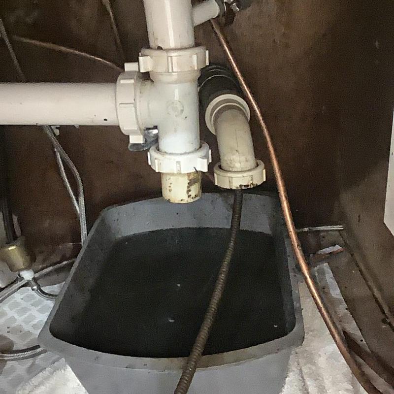 Kitchen sink drain pipes with drain cleaning cable