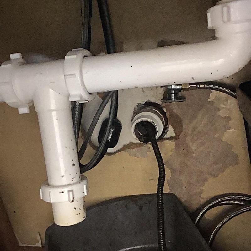 Kitchen sink drain pipe and cleanout access