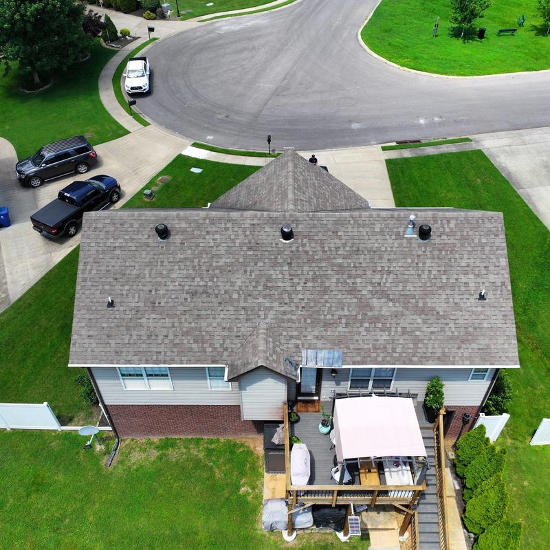 Shingle roof with hail damage and granule loss