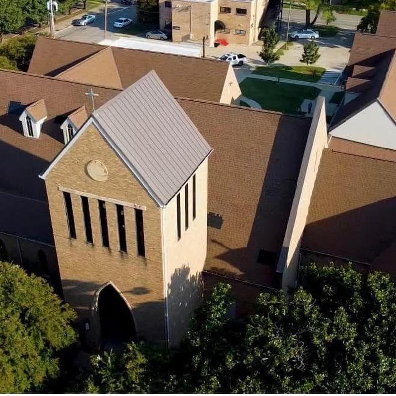 Church metal roof panel system with hail damage