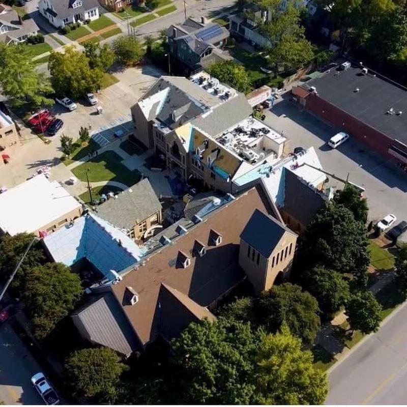 Church roof with hail damage in repair prep