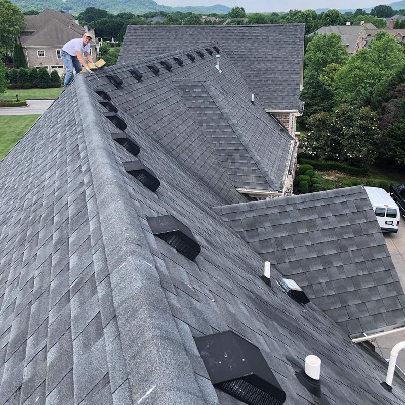 Asphalt shingle roof with ridge vents inspection